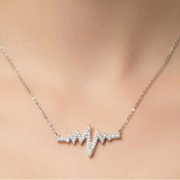 Sterling Silver .20cts Diamond Heartbeat with Chain Necklace - Picture 1 of 6